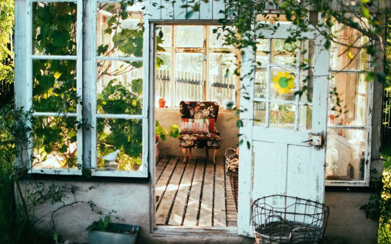 Open door to a sun room filled with light