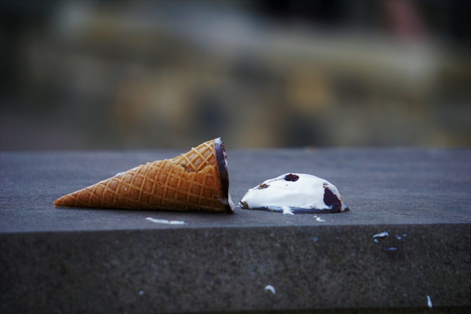 Ice cream cone on the sidewalk